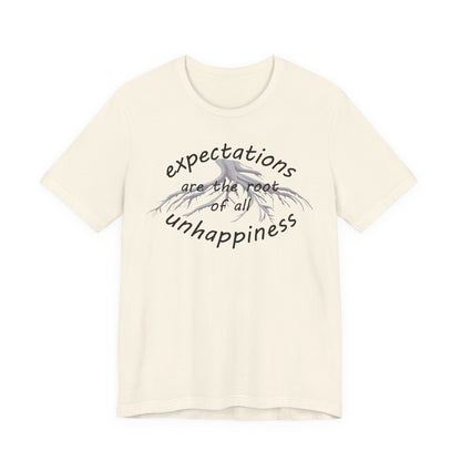 Beige t-shirt with motivational quote on a white background