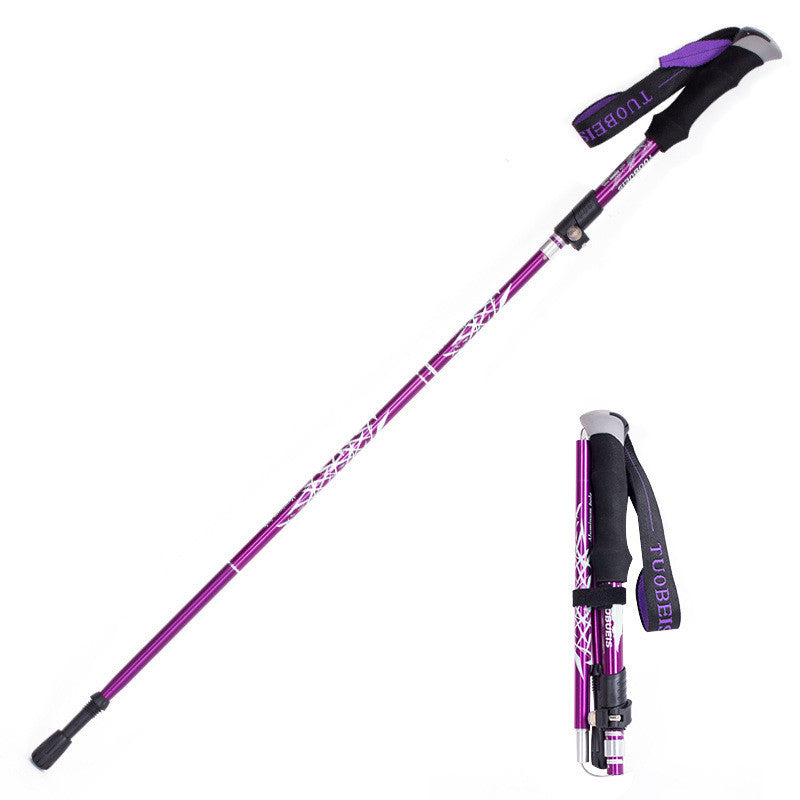 Purple and black hiking poles on a white background