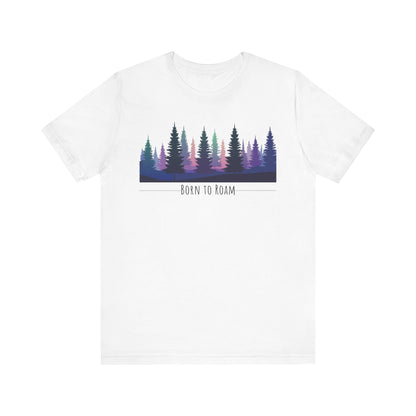 White t-shirt with a colorful forest graphic and 'Born to Roam' text on a white background