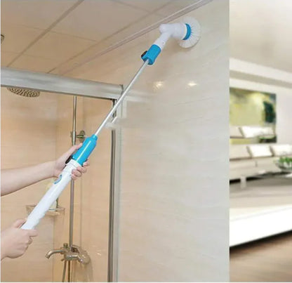 Cleaning tool with a long handle being used to clean a ceiling in a bathroom.
