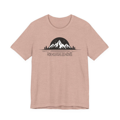 Heather peach t-shirt with mountain graphic and text on a white background